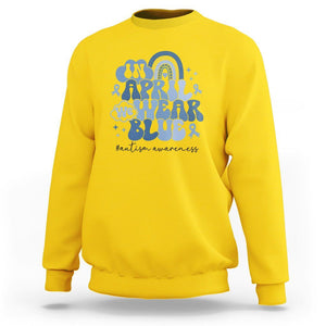 Autism Awareness Sweatshirt In April We Wear Blue Rainbow Retro Groovy TS01 Daisy Printyourwear