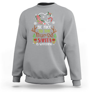 Be Nice To The Nurse Santa is Watching Funny Christmas Sweatshirt TS09 Printyourwear