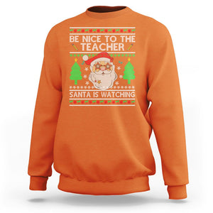 Be Nice To The Teacher Santa Is Watching Claus Ugly Christmas Sweatshirt TS02 Orange Printyourwear