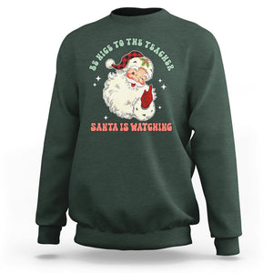 Be Nice To The Teacher Santa Is Watching Retro Groovy Christmas Sweatshirt TS02 Dark Forest Green Printyourwear