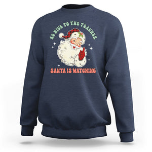 Be Nice To The Teacher Santa Is Watching Retro Groovy Christmas Sweatshirt TS02 Navy Printyourwear