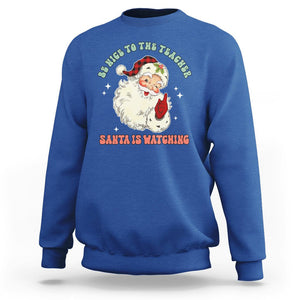 Be Nice To The Teacher Santa Is Watching Retro Groovy Christmas Sweatshirt TS02 Royal Blue Printyourwear