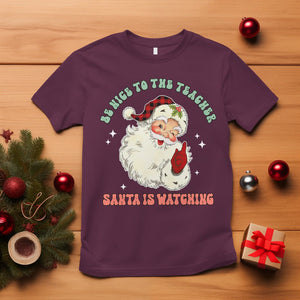 Be Nice To The Teacher Santa Is Watching Retro Groovy Christmas T Shirt TS02 Maroon Printyourwear