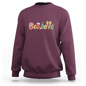 Believe Christmas Sweatshirt Santa Claus Reindeer Candy Cane Groovy Xmas TS02 Maroon Printyourwear