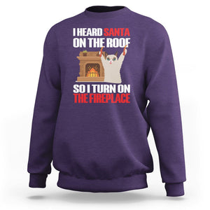 Cat Hates Santa Turned On The Fireplace Funny Christmas Sweatshirt TS09 Purple Printyourwear