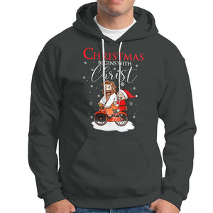 Christmas Begins With Christ Jesus Santa Riding Bicycle Hoodie TS09 Dark Heather Printyourwear