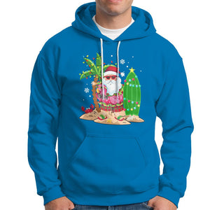 Christmas In Hawaii Hoodie Flamingo Float Xmas Palm Tree Surfboard Cute Santa At Beach TS09 Sapphire Printyourwear