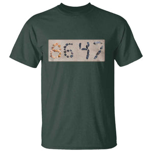86 47 Seashell Beach Sand Graphic T Shirt Subtle Coastal Summer Political Satire TS02 Dark Forest Green Print Your Wear
