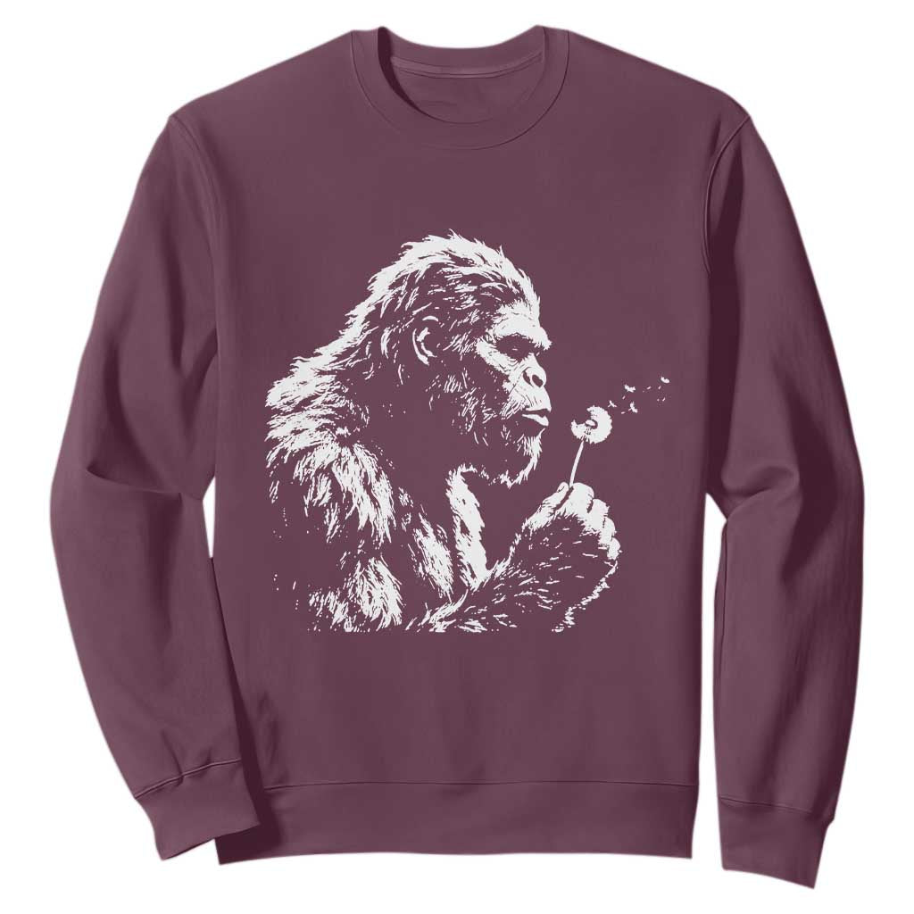 Bigfoot Blowing Dandelion Flower Graphic Sweatshirt Whimsical Sasquatch Profile Artistic Vintage Distressed TS02 Maroon Print Your Wear