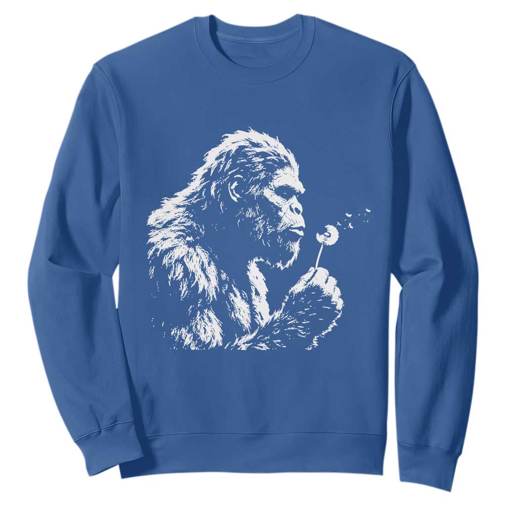 Bigfoot Blowing Dandelion Flower Graphic Sweatshirt Whimsical Sasquatch Profile Artistic Vintage Distressed TS02 Royal Blue Print Your Wear