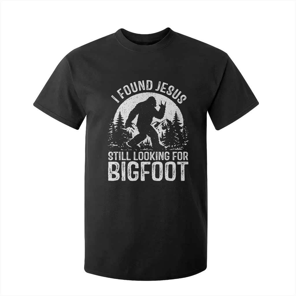 Funny Christian Sasquatch T Shirt For Kid I Found Jesus Still Looking for Bigfoot Vintage Distressed Graphic TS02 Black Print Your Wear