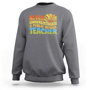 Never Underestimate A Public School Teacher Sweatshirt Tim Walz 2024 Saying Public Education TS02 Charcoal Print Your Wear