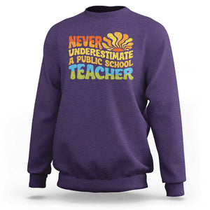 Never Underestimate A Public School Teacher Sweatshirt Tim Walz 2024 Saying Public Education TS02 Purple Print Your Wear