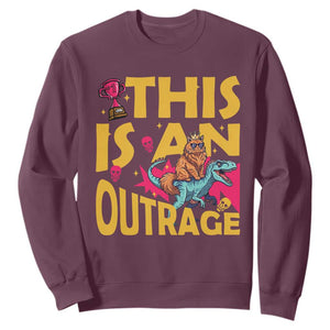 This Is An Outrage Sassy Cat Riding Raptor Dinosaur Sweatshirt Retro Pop Art Graphic TS02 Maroon Print Your Wear