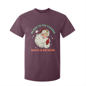 Be Nice To The Teacher Santa Is Watching Retro Groovy Christmas T Shirt For Kid TS02 Maroon Print Your Wear