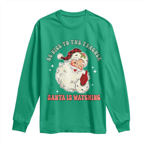 Be Nice To The Teacher Santa Is Watching Retro Groovy Christmas Long Sleeve Shirt TS02 Irish Green Print Your Wear