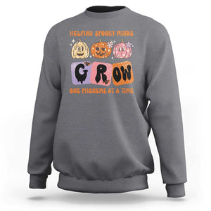 Halloween Reading Sweatshirt Helping Spooky Minds Grow One Phoneme Dyslexia Pumpkin TS02 Charcoal Print Your Wear