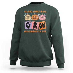 Halloween Reading Sweatshirt Helping Spooky Minds Grow One Phoneme Dyslexia Pumpkin TS02 Dark Forest Green Print Your Wear