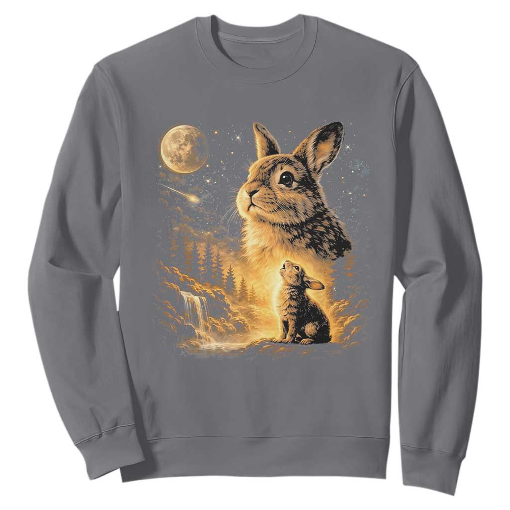 Mystical Moonlit Bunny Graphic Sweatshirt Glowing Rabbit Under Full Moon Waterfall Nature Scene TS02 Charcoal Print Your Wear