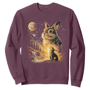Mystical Moonlit Bunny Graphic Sweatshirt Glowing Rabbit Under Full Moon Waterfall Nature Scene TS02 Maroon Print Your Wear