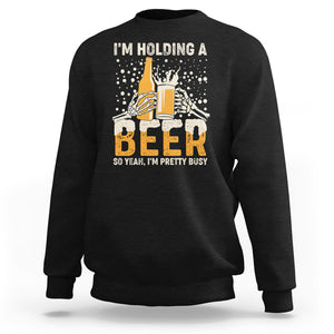 I'm Holding A Beer So Yeah I'm Pretty Busy Funny Beer Lover Sweatshirt TS02 Dark Heather Printyourwear