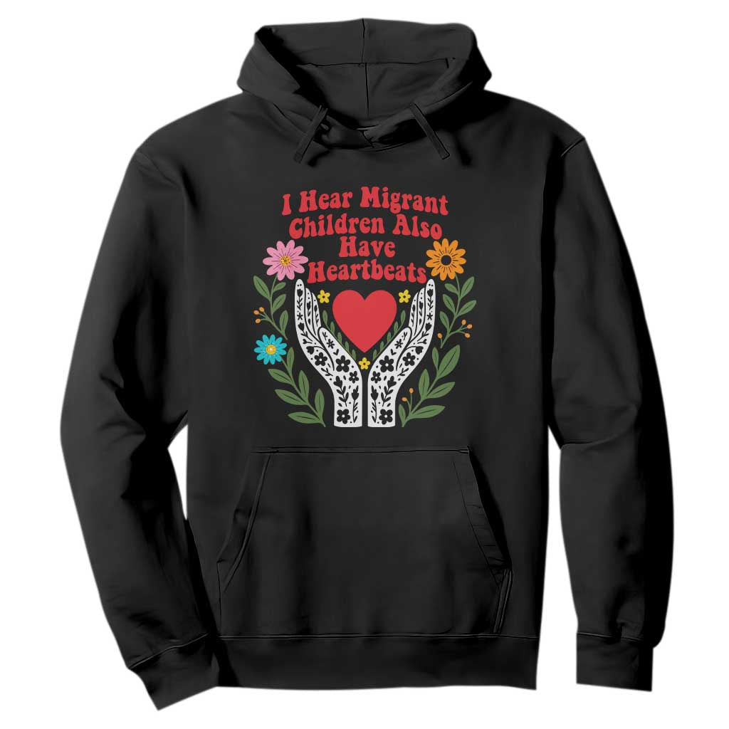 I Hear Migrant Children Also Have Heartbeats Hoodie Groovy Retro Floral Hands Heart Social Justice TS02 Black Print Your Wear