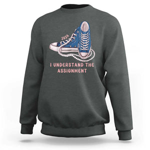 Kamala Harris 2024 Sweatshirt I Understand The Assignment Vote Blue Chuck And Pearls TS02 Dark Heather Print Your Wear