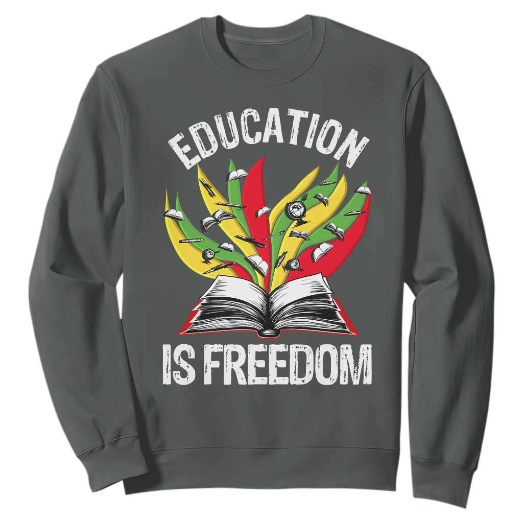 Education Is Freedom Sweatshirt Teaching Black History Month Books TS02 Dark Heather Print Your Wear