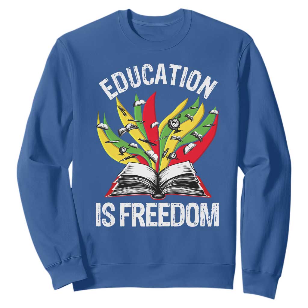 Education Is Freedom Sweatshirt Teaching Black History Month Books TS02 Royal Blue Print Your Wear
