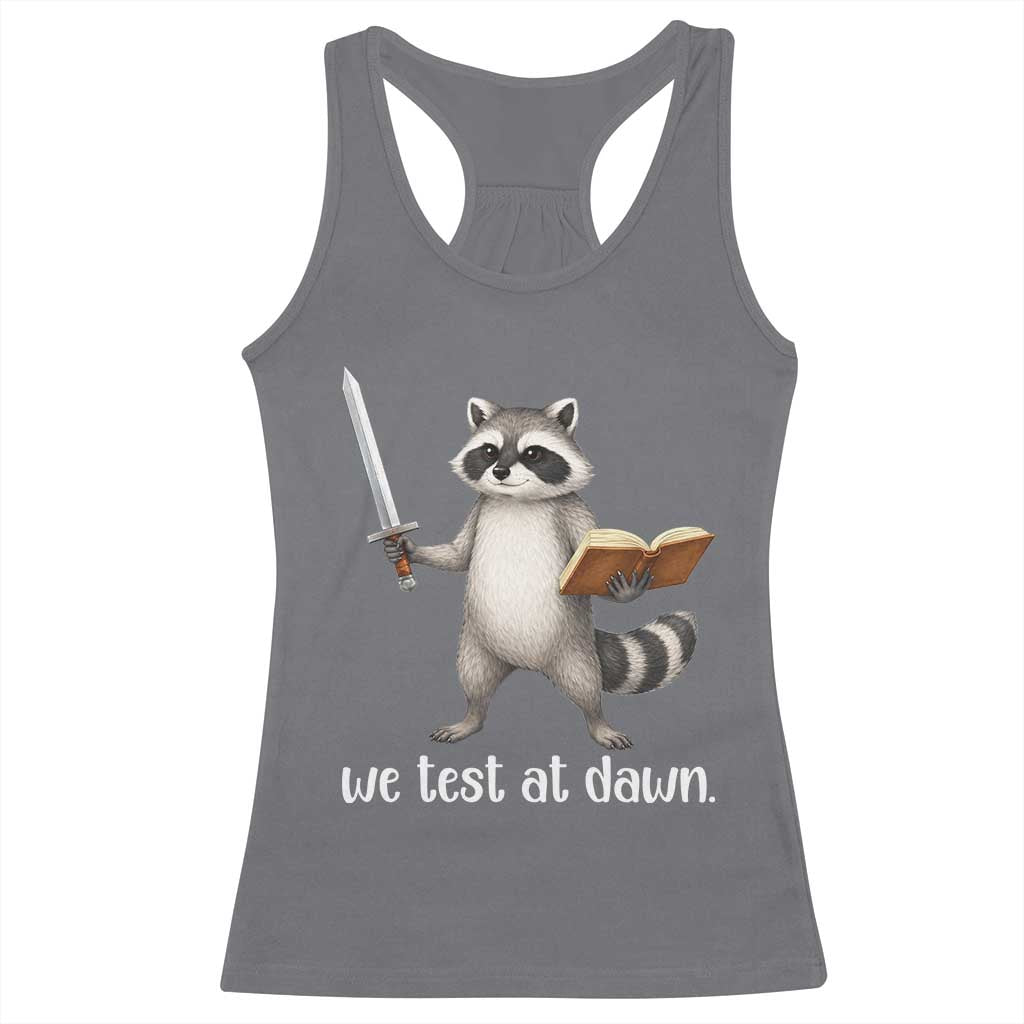 We Test At Dawn Raccoon Warrior Racerback Tank Top Funny Student Teacher Exam Motivation TS02 Charcoal Print Your Wear