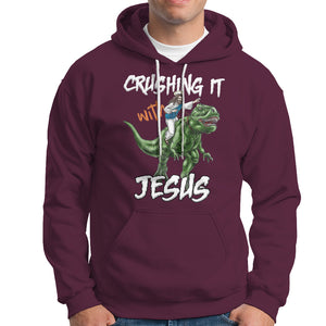 Crushing It With Jesus Hoodie Funny Riding Dinosaur TS02 Maroon Printyourwear