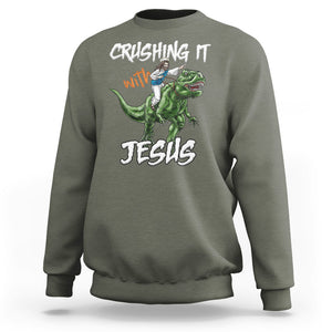 Crushing It With Jesus Sweatshirt Funny Riding Dinosaur TS02 Military Green Printyourwear