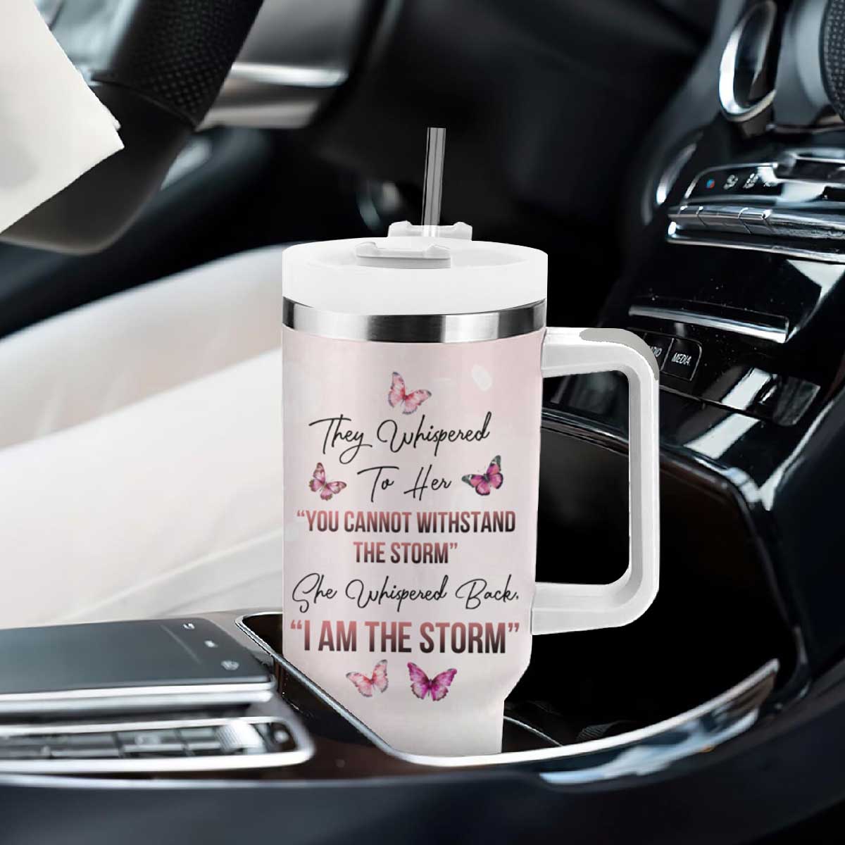 They Whispered To Her You Cannot Withstand The Storm She Whispered Back I Am The Storm Tumbler With Handle Personalized TS04 Print Your Wear