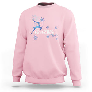 Freezing Season Christmas Reindeer Snowflake Sweatshirt TS09 Light Pink Printyourwear