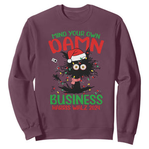 Christmas Harris Walz Sweatshirt Funny Santa Cat Mind Your Own Damn Business TS09 Maroon Print Your Wear