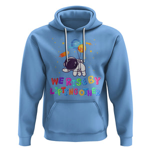 We Rise By Lifting Other Outer Space Astronaut Planet Balloon Motivational Quote Hoodie TS09 Carolina Blue Printyourwear