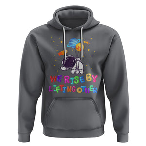 We Rise By Lifting Other Outer Space Astronaut Planet Balloon Motivational Quote Hoodie TS09 Charcoal Printyourwear