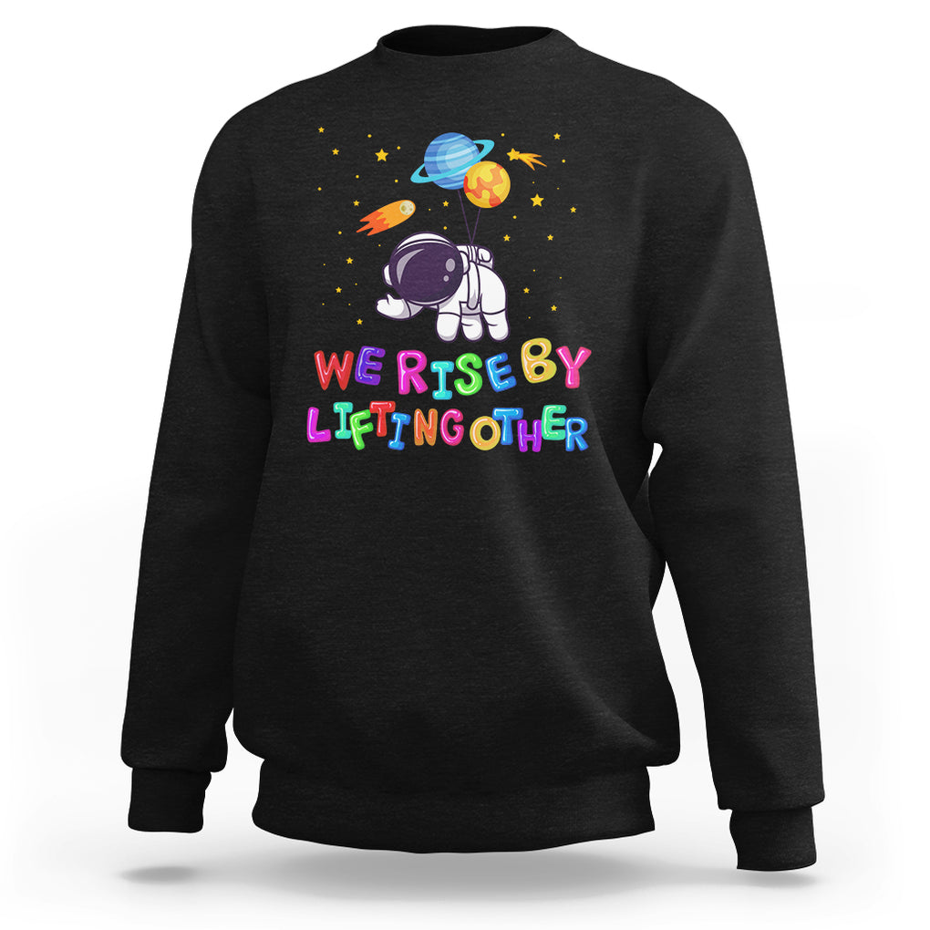 We Rise By Lifting Other Outer Space Astronaut Planet Balloon Motivational Quote Sweatshirt TS09 Black Printyourwear