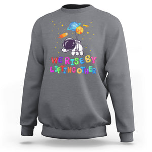 We Rise By Lifting Other Outer Space Astronaut Planet Balloon Motivational Quote Sweatshirt TS09 Charcoal Printyourwear