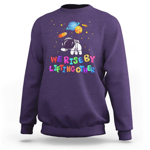 We Rise By Lifting Other Outer Space Astronaut Planet Balloon Motivational Quote Sweatshirt TS09 Purple Printyourwear