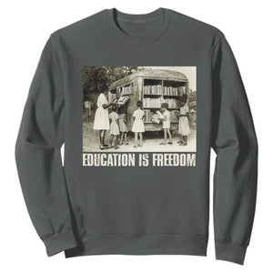 Education Is Freedom Sweatshirt Black Educator Bookish Black History Month TS09 Dark Heather Print Your Wear