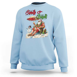 Funny Christmas In July Sweatshirt Sandy And Bright Santa At The Beach TS09 Light Blue Print Your Wear