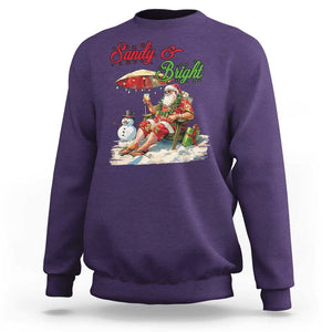 Funny Christmas In July Sweatshirt Sandy And Bright Santa At The Beach TS09 Purple Print Your Wear