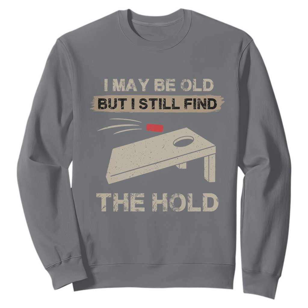 I May Be Old But I Still Find The Hole Cornhole Sweatshirt Funny Old Man Saying TS10 Charcoal Print Your Wear