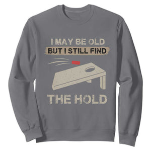 I May Be Old But I Still Find The Hole Cornhole Sweatshirt Funny Old Man Saying TS10 Charcoal Print Your Wear
