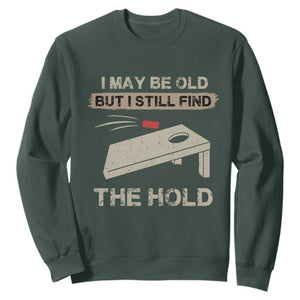 I May Be Old But I Still Find The Hole Cornhole Sweatshirt Funny Old Man Saying TS10 Dark Forest Green Print Your Wear
