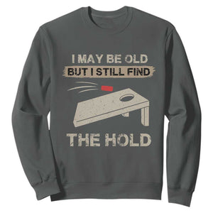 I May Be Old But I Still Find The Hole Cornhole Sweatshirt Funny Old Man Saying TS10 Dark Heather Print Your Wear