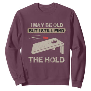 I May Be Old But I Still Find The Hole Cornhole Sweatshirt Funny Old Man Saying TS10 Maroon Print Your Wear