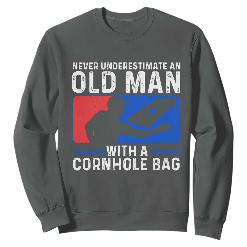 Funny Cornhole Player Sweatshirt Never Underestimate An Old Man With A Cornhole Bag TS10 Dark Heather Print Your Wear