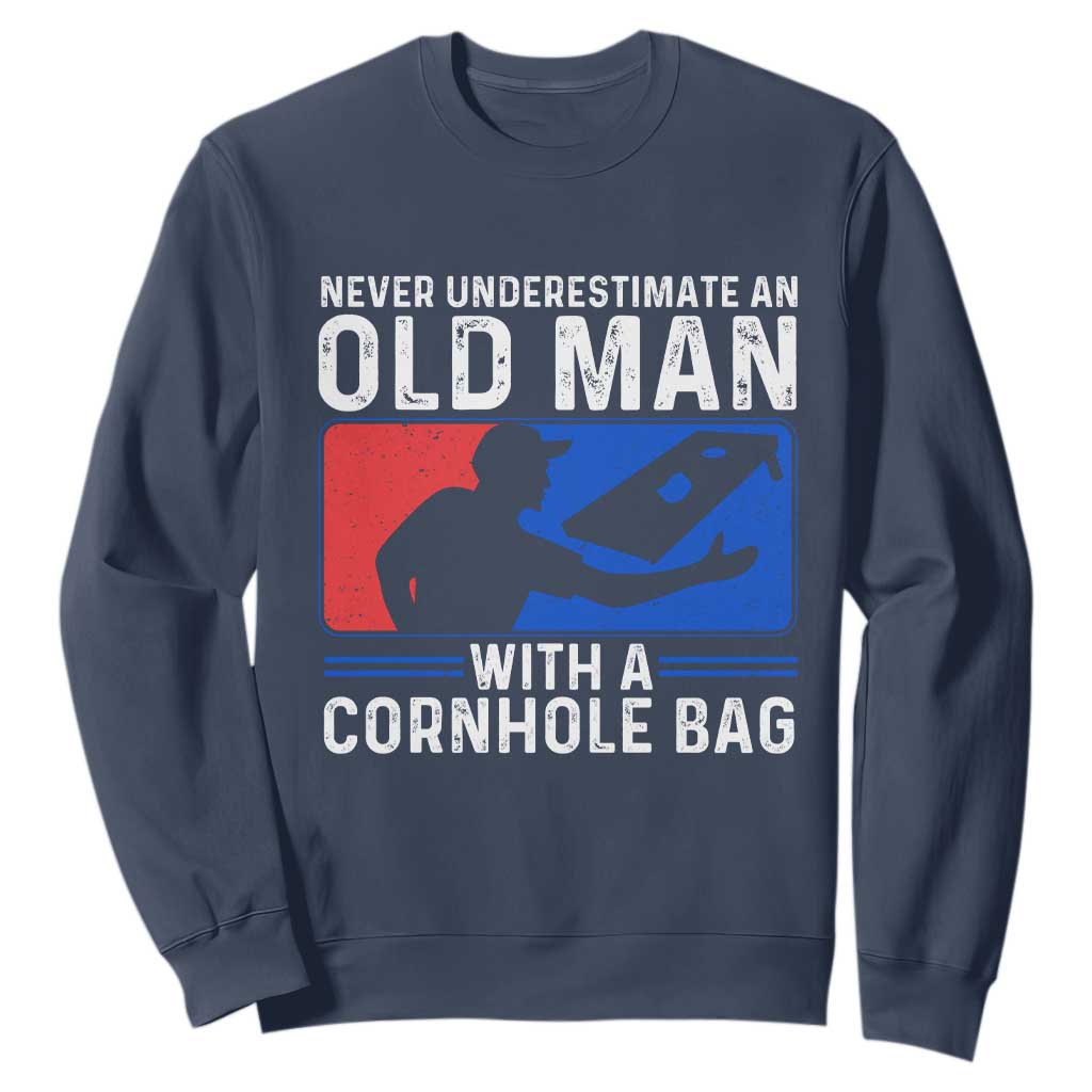 Funny Cornhole Player Sweatshirt Never Underestimate An Old Man With A Cornhole Bag TS10 Navy Print Your Wear